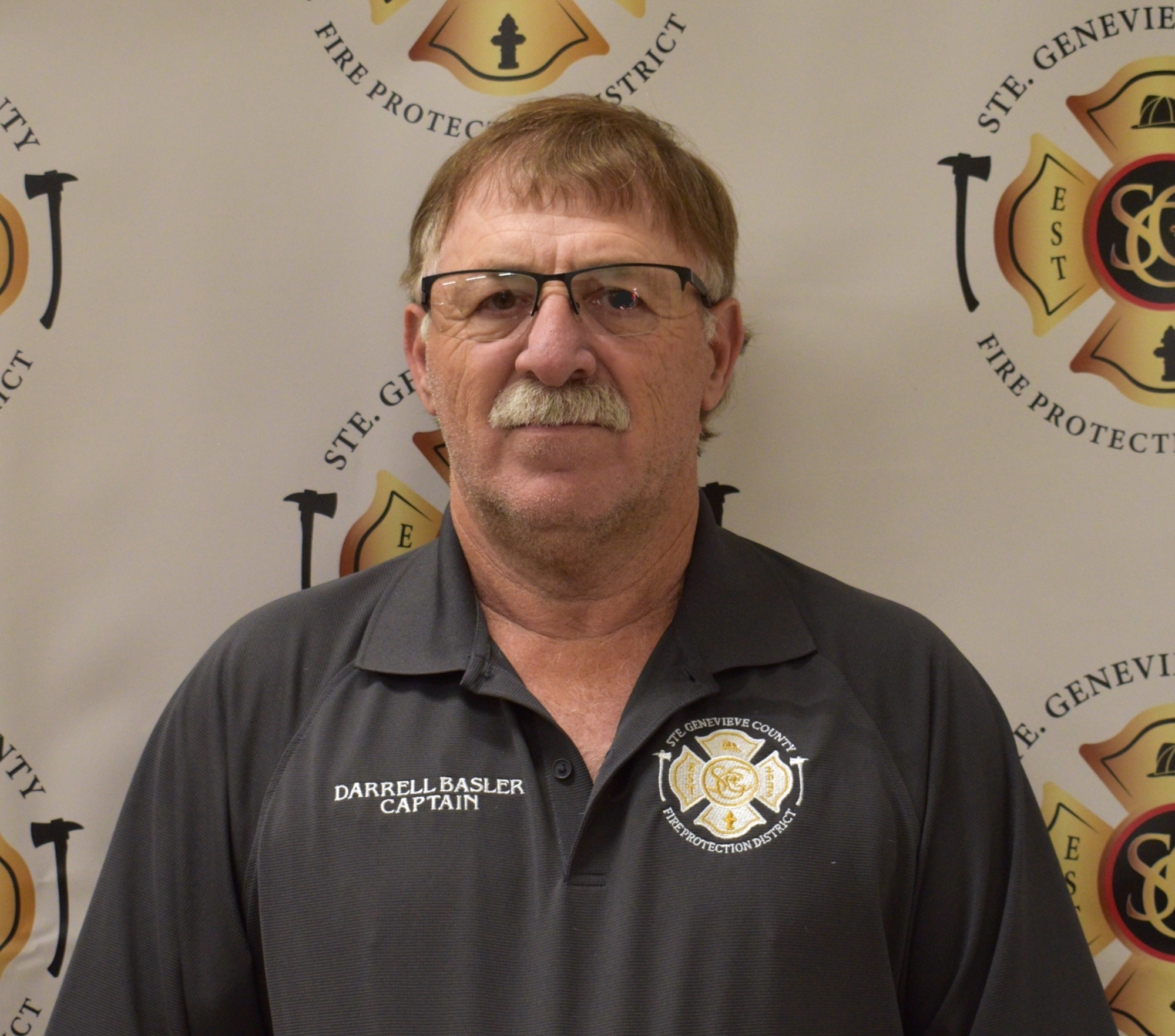 May contain: adult, male, man, person, accessories, glasses, face, head, badge, logo, and symbol