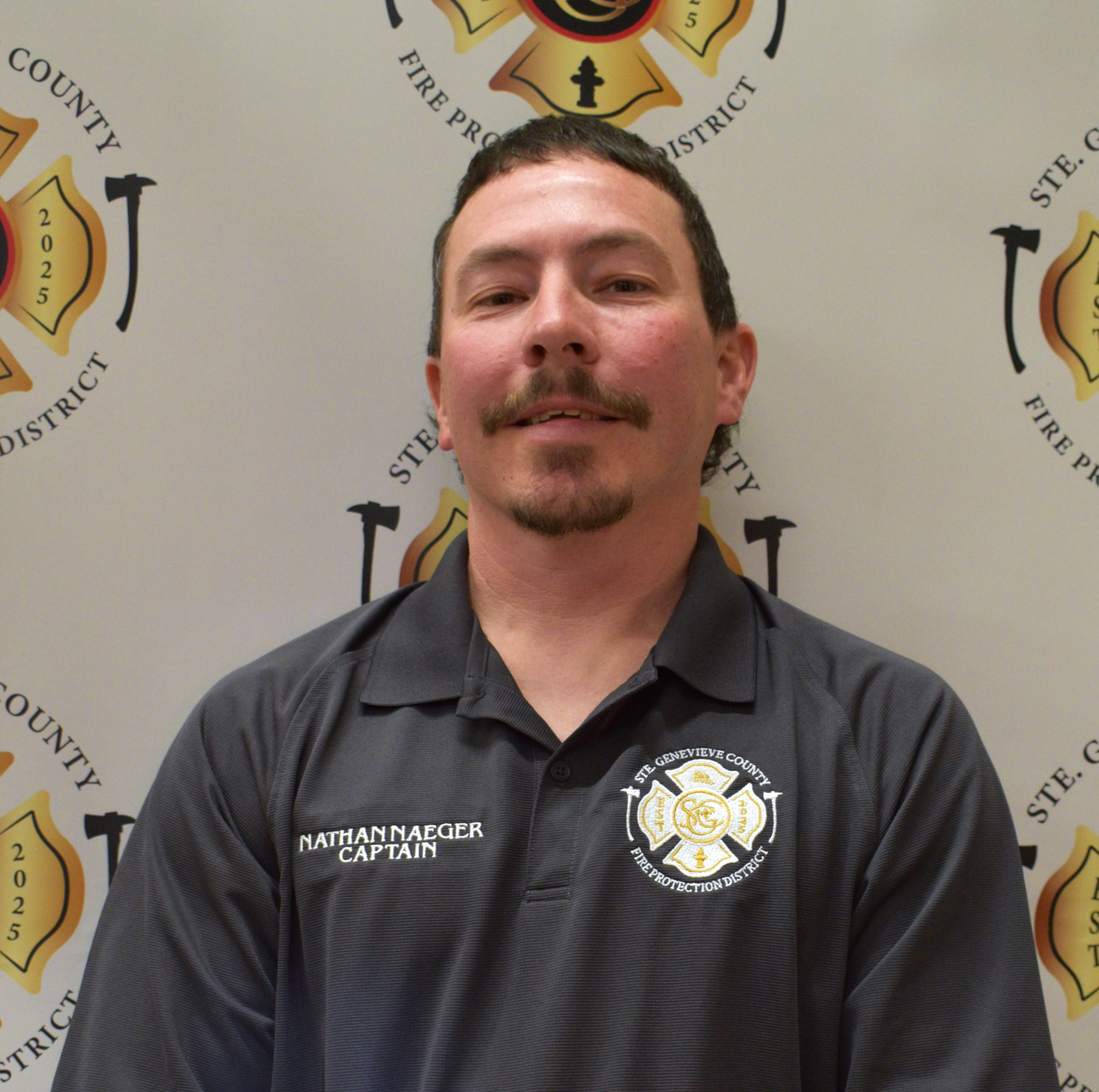 May contain: adult, male, man, person, face, head, clothing, and shirt