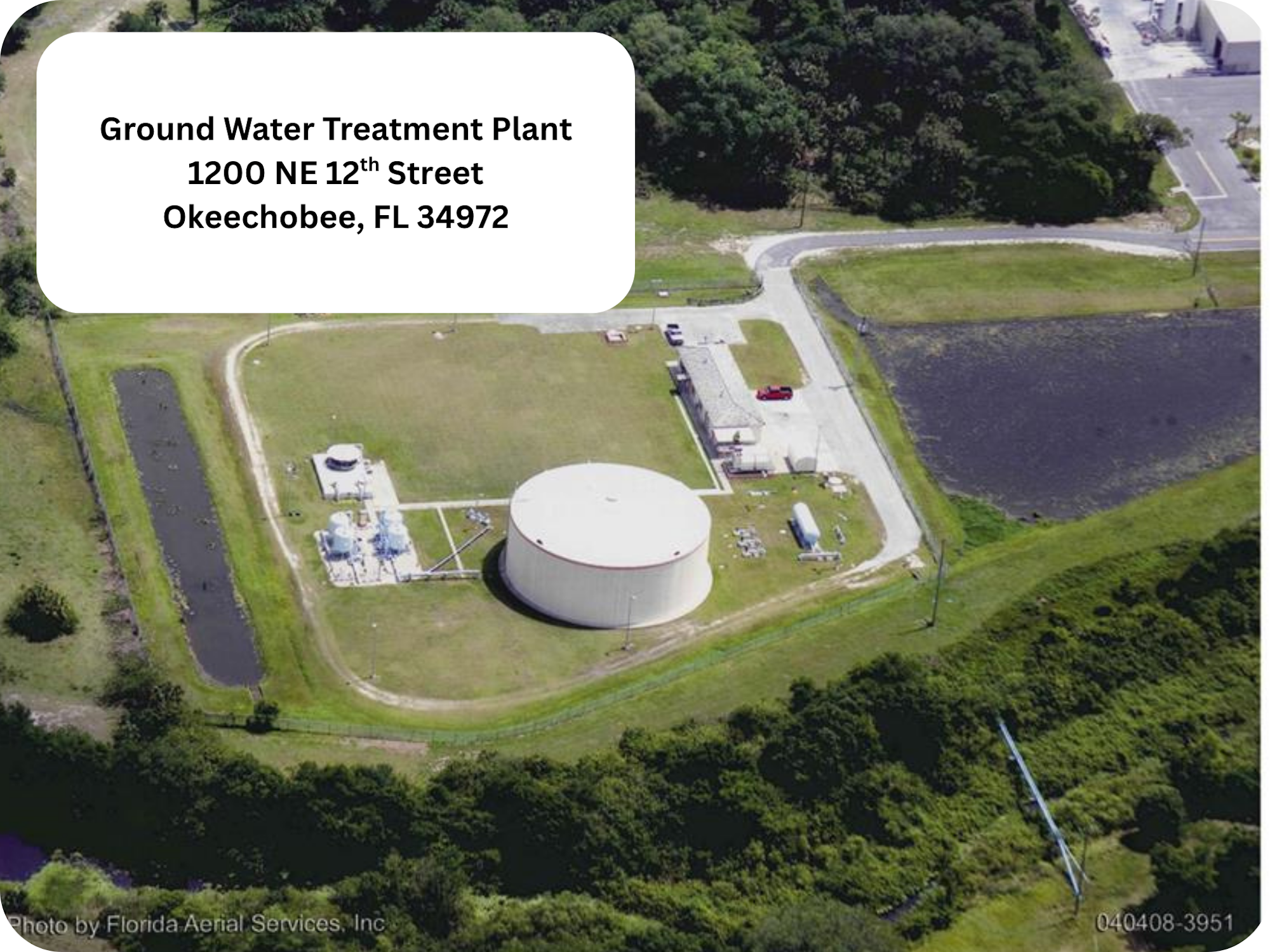 Aerial view of a groundwater treatment plant located at 1200 NE 12th Street, Okeechobee, FL 34972, with surrounding greenery.