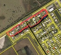 The image appears to be a map showing residential areas with highlighted streets and possibly waterways.