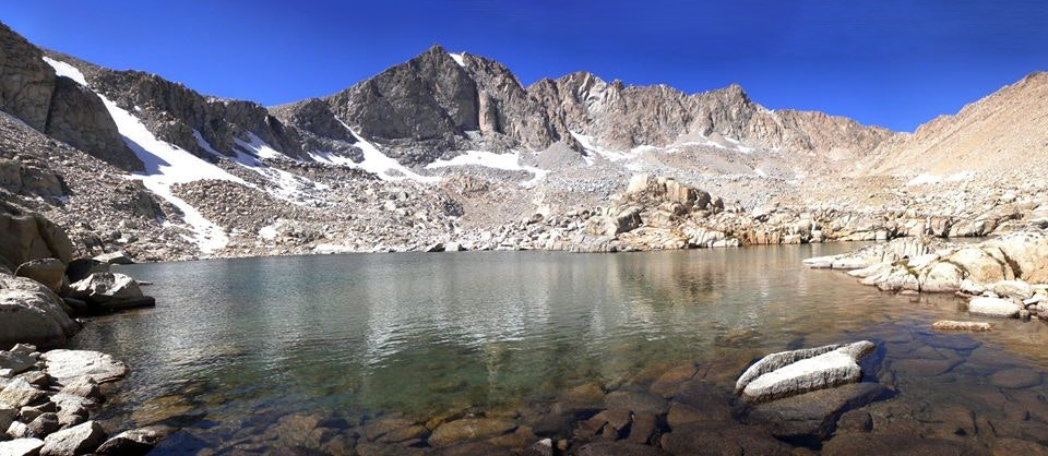 May contain: nature, outdoors, mountain, mountain range, peak, rock, panoramic, scenery, and landscape