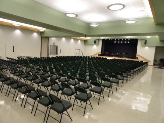 May contain: furniture, chair, indoors, room, auditorium, hall, theater, and interior design