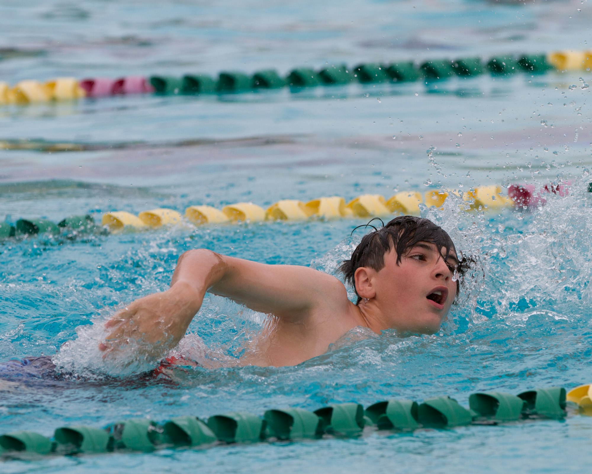 May contain: swimming, sport, sports, water, person, and human